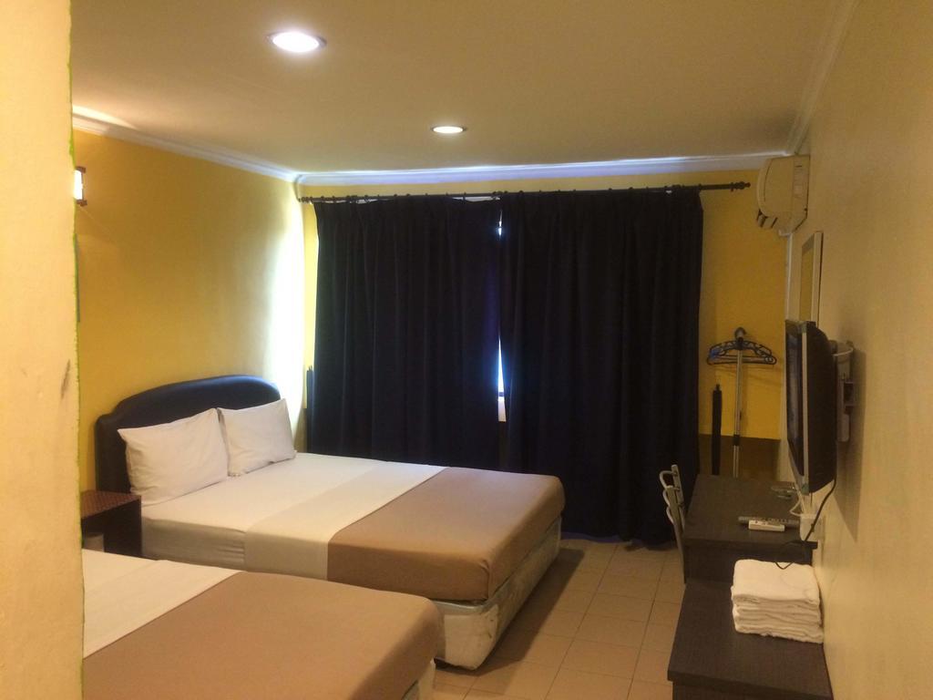 City Star Hotel Kulai Szoba fotó