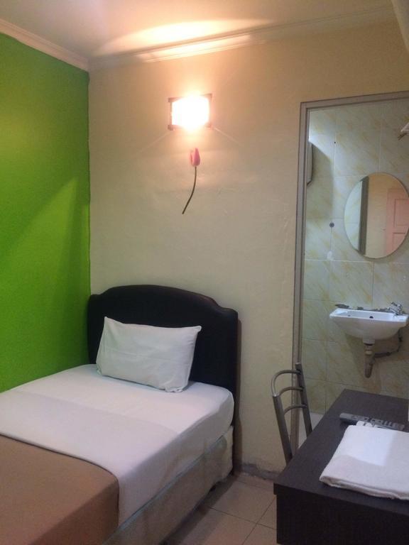 City Star Hotel Kulai Szoba fotó