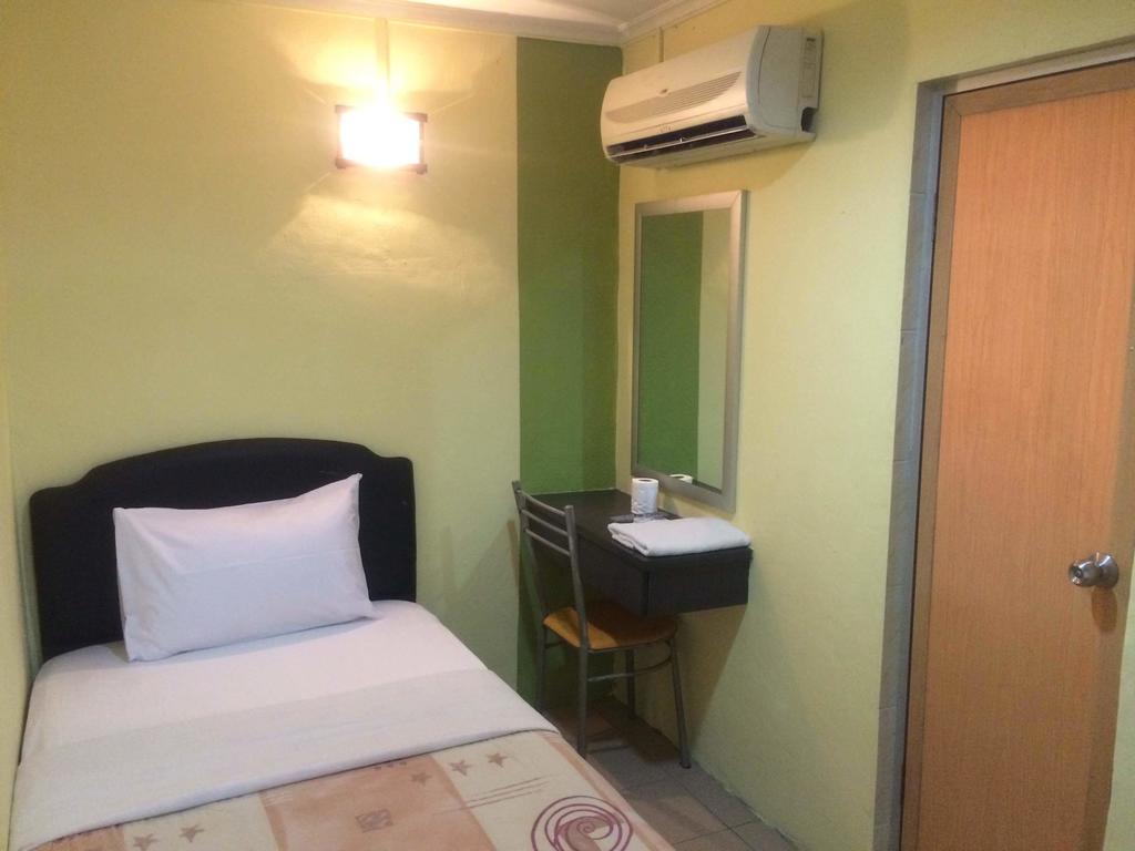 City Star Hotel Kulai Szoba fotó