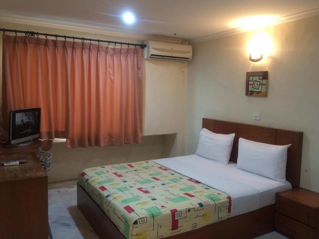 City Star Hotel Kulai Szoba fotó