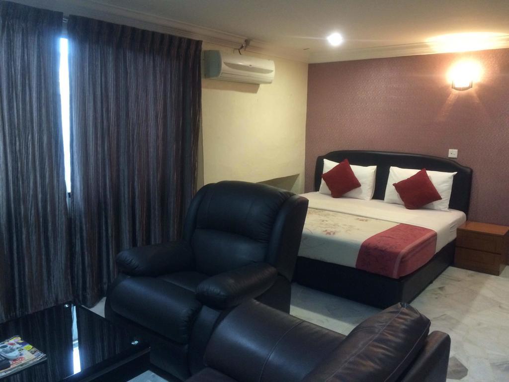City Star Hotel Kulai Szoba fotó